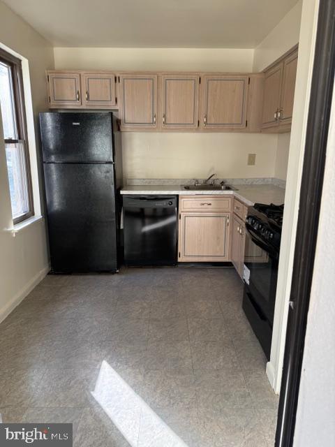 5860 Thunder Hill Road, Unit B2 Columbia, MD 21045 - Photo 12 of 35 a kitchen with a refrigerator sink and stove