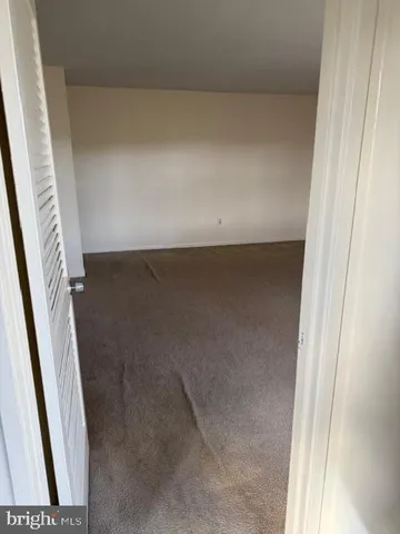 a bathroom with a toilet and a sink