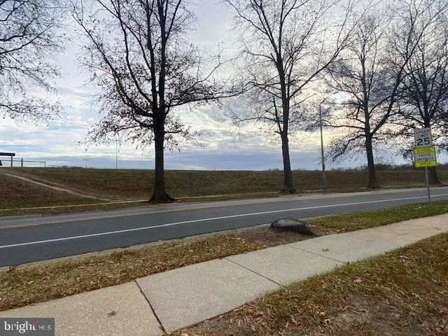 a view of a city street with cars