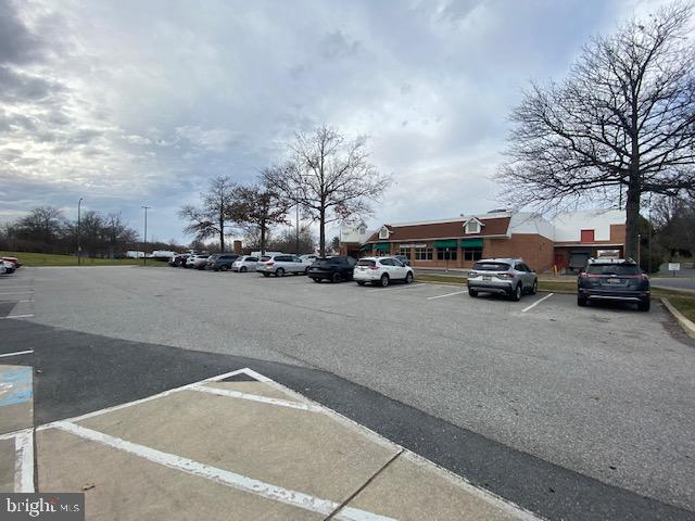 5860 Thunder Hill Road, Unit B2 Columbia, MD 21045 - Photo 26 of 35 a view of city street with parked cars