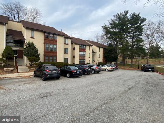 5860 Thunder Hill Road, Unit B2 Columbia, MD 21045 - Photo 3 of 35 a view of a street with cars