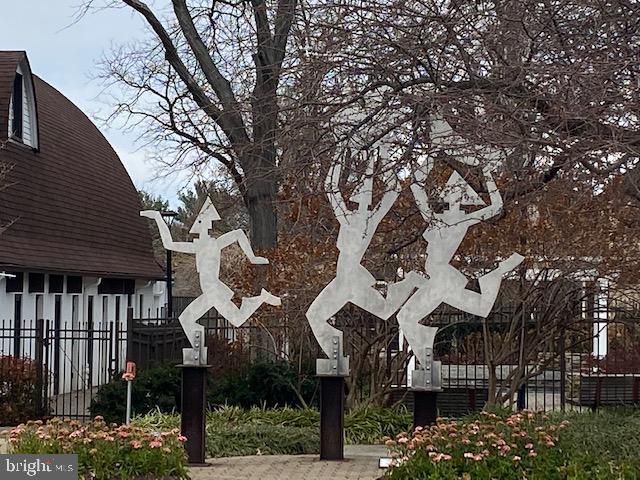 5860 Thunder Hill Road, Unit B2 Columbia, MD 21045 - Photo 32 of 35 a view of a large building with a tree