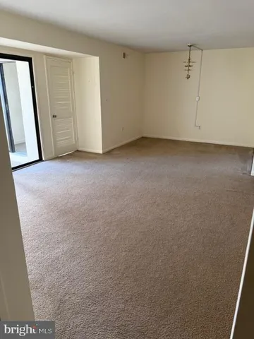 an empty room with staircase