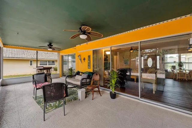 a outdoor space with lots of tables and chairs