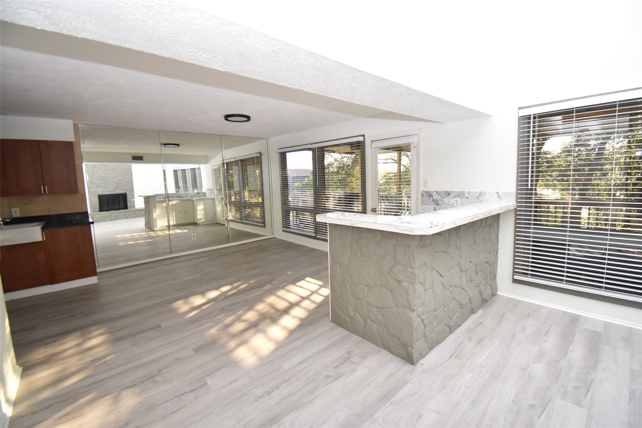 82 Harbor Lane Kemah, TX 77565 - Photo 5 of 33 a living room with a couch and a view of kitchen appliances