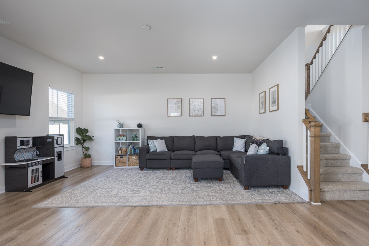 3232 Firerock Drive Murfreesboro, TN 37128 - Photo 11 of 45 a living room with furniture and a flat screen tv