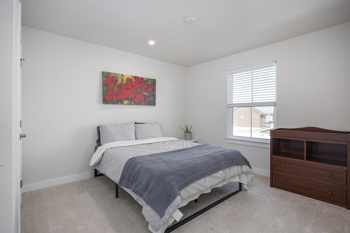 3232 Firerock Drive Murfreesboro, TN 37128 - Photo 29 of 45 a bedroom with a bed and a window