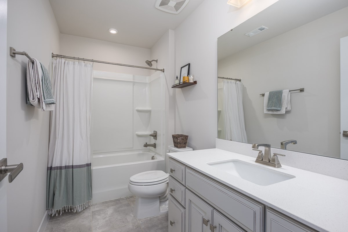3232 Firerock Drive Murfreesboro, TN 37128 - Photo 30 of 45 a bathroom with a sink toilet tub and shower