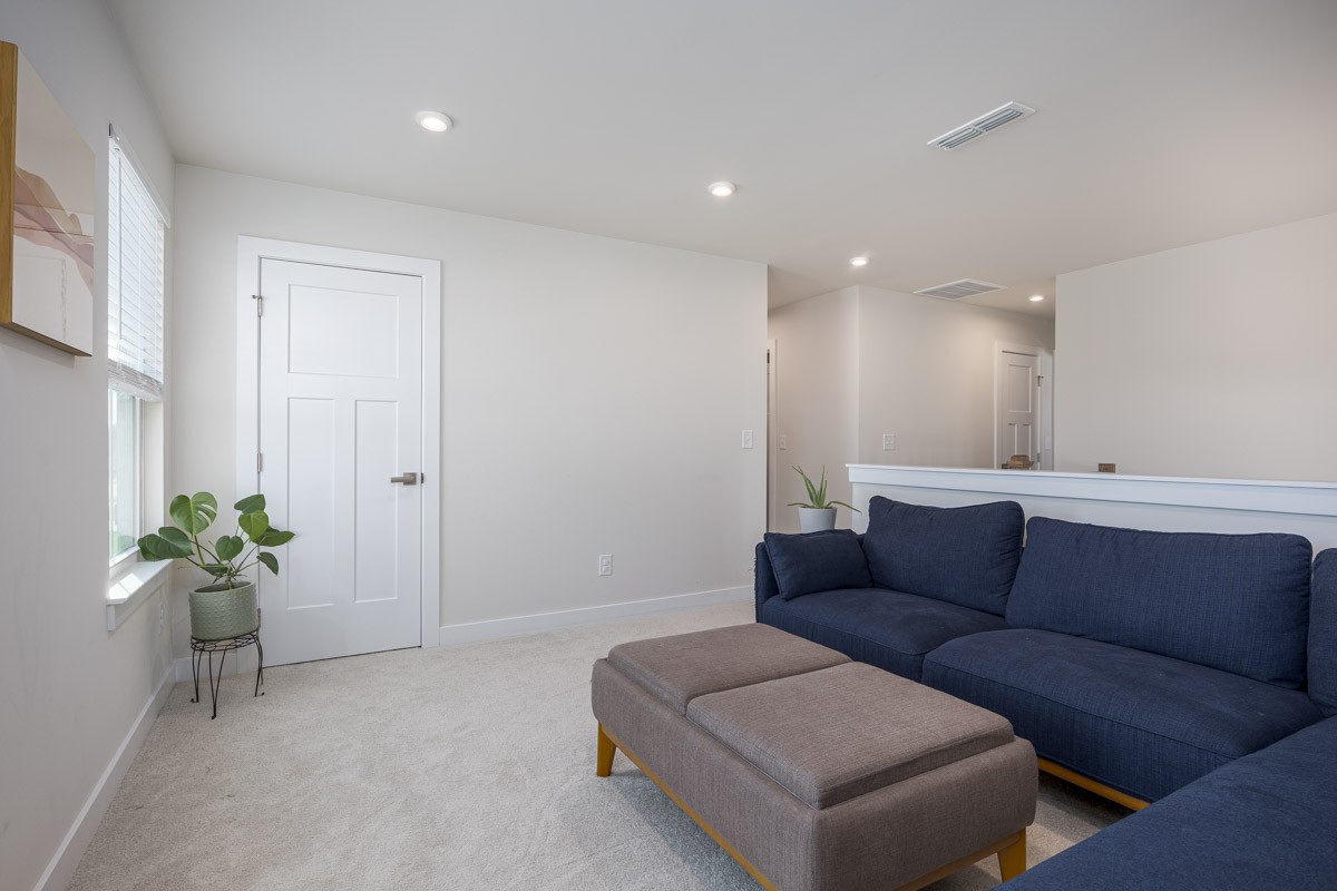 3232 Firerock Drive Murfreesboro, TN 37128 - Photo 34 of 45 a living room with furniture and a potted plant