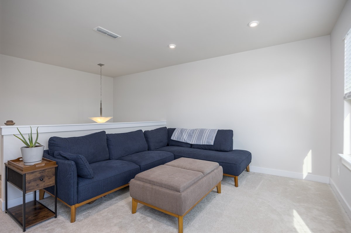 3232 Firerock Drive Murfreesboro, TN 37128 - Photo 35 of 45 a living room with furniture and a couch