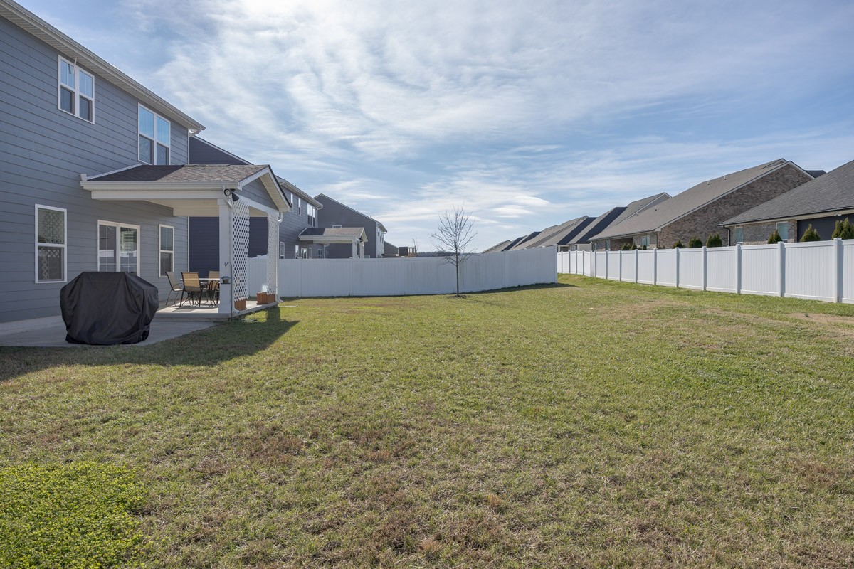 3232 Firerock Drive Murfreesboro, TN 37128 - Photo 40 of 45 a view of a house with a backyard and tub