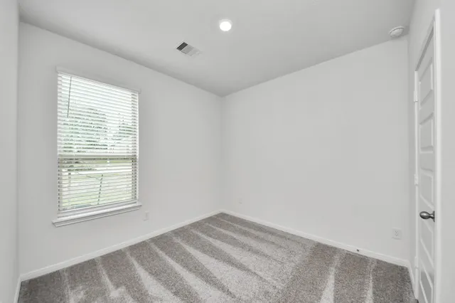 an empty room with closet