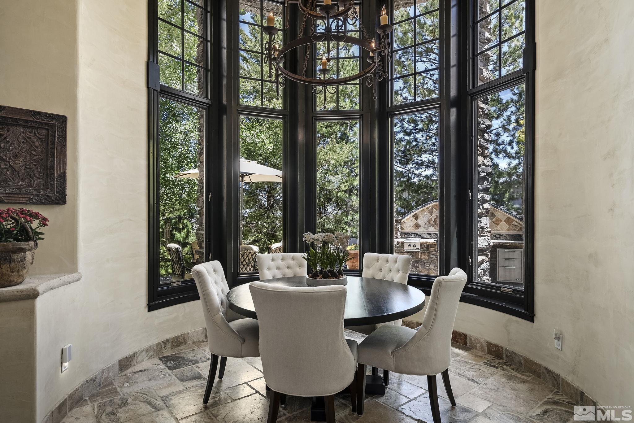 90 Hawken Road Reno, NV 89519 - Photo 15 of 40 a view of a dining room with furniture window and outside view