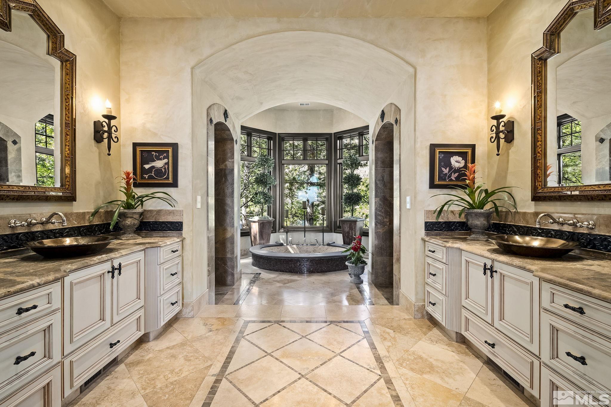 90 Hawken Road Reno, NV 89519 - Photo 20 of 40 a large kitchen with granite countertop a sink stove and cabinets