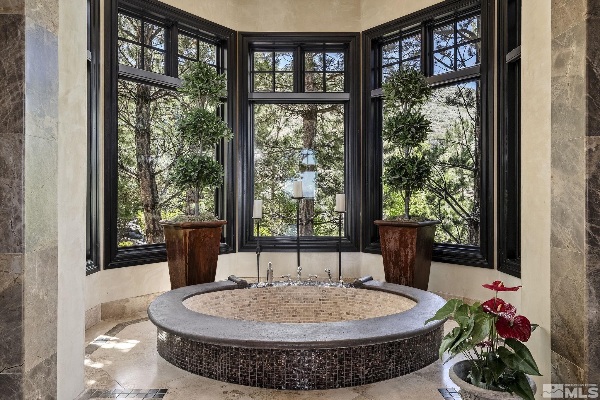 90 Hawken Road Reno, NV 89519 - Photo 21 of 40 a dining room with a table and chairs