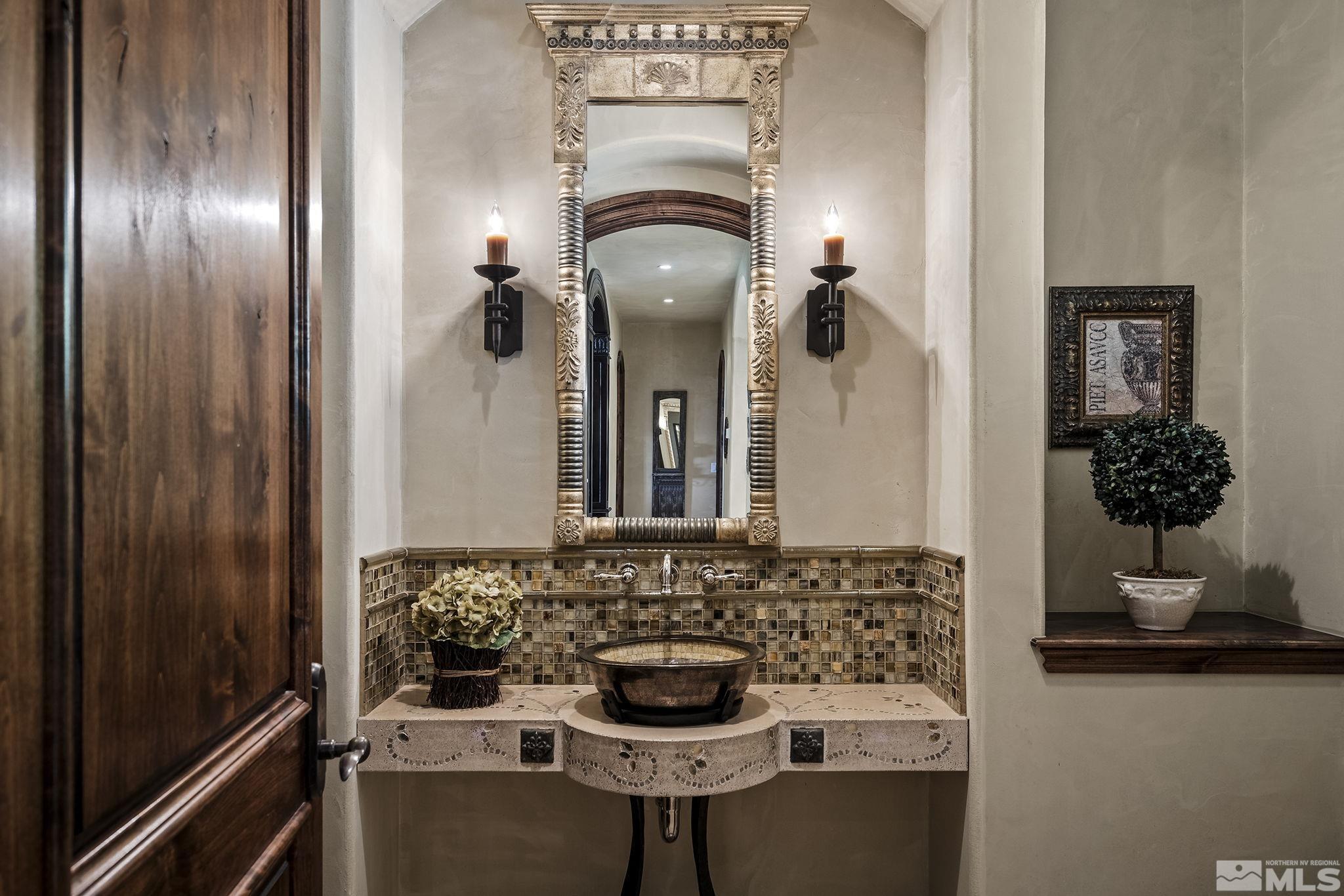 90 Hawken Road Reno, NV 89519 - Photo 23 of 40 a bathroom with a sink and a mirror