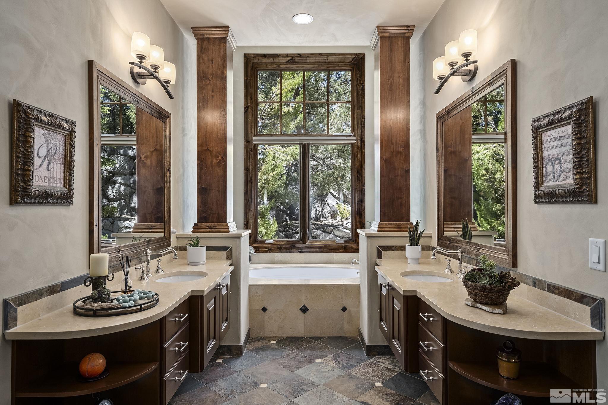 90 Hawken Road Reno, NV 89519 - Photo 26 of 40 a bathroom with a sink double vanity and a window
