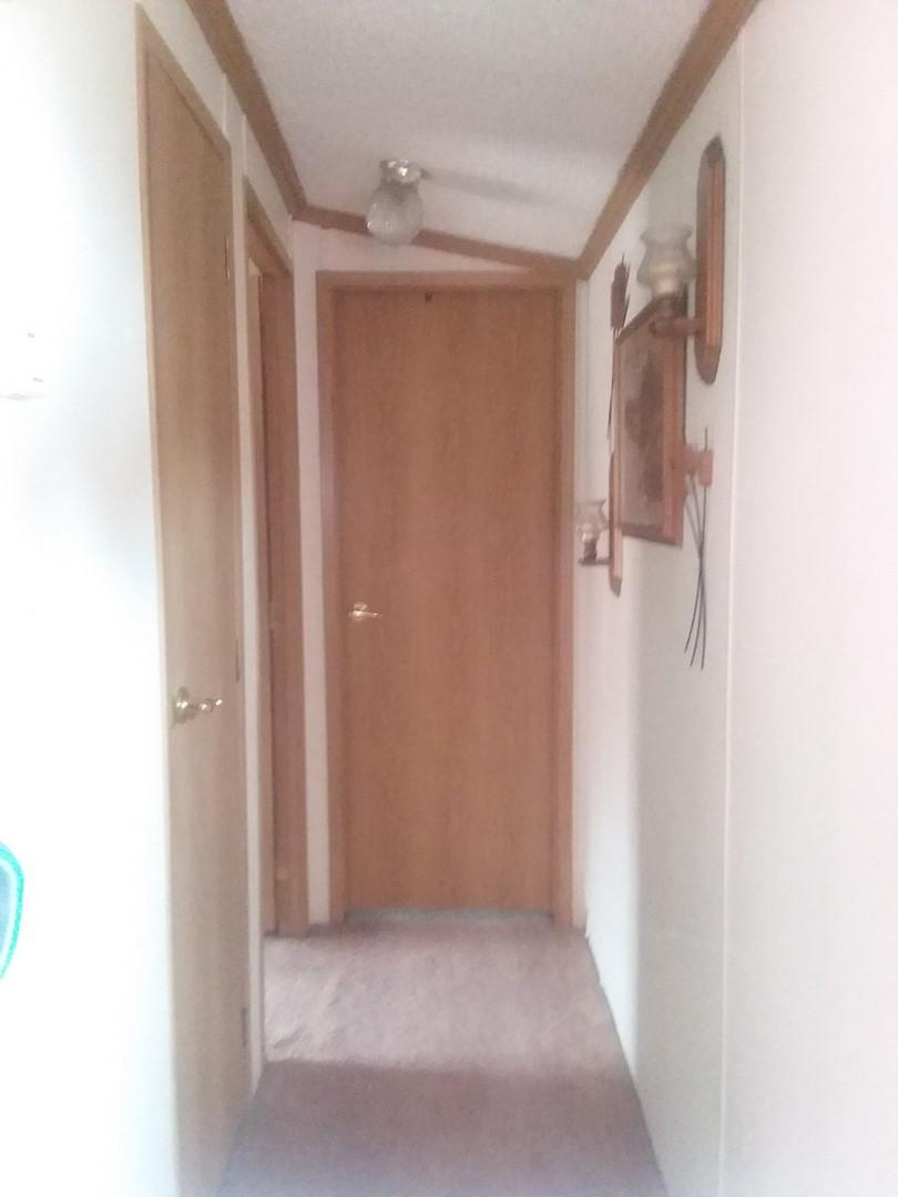 73 Sennebec Road Union, ME 04862 - Photo 8 of 17 8) Hallway looking towards 2nd and 3rd b