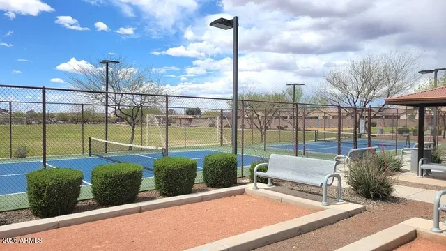 a view of a patio with couches and table chairs