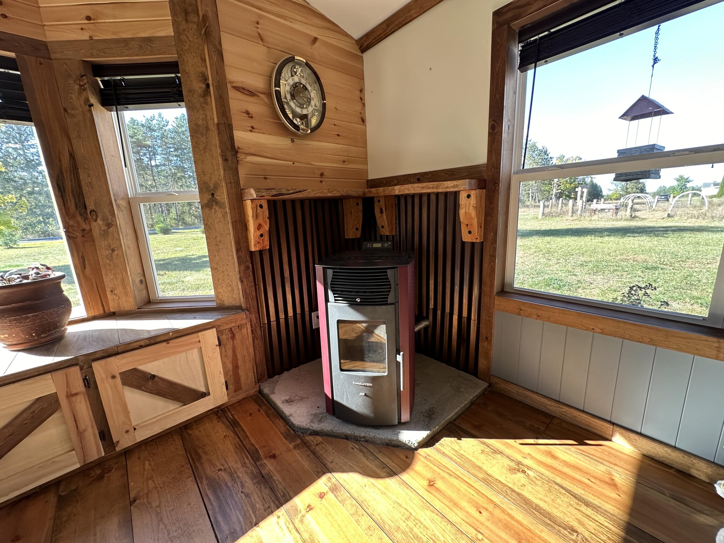 10225 Summit City Road Kingsley, MI 49649 - Photo 12 of 60 Pellet Stove keeps 2,200sq.ft. warm