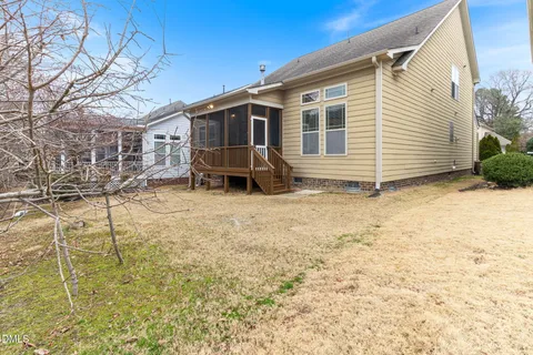 a view of outdoor space with wooden floor