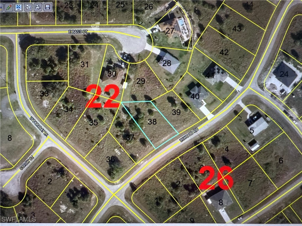 Inwood Road LaBelle, FL 33935 - Photo 4 of 8 an aerial view of a house with swimming pool