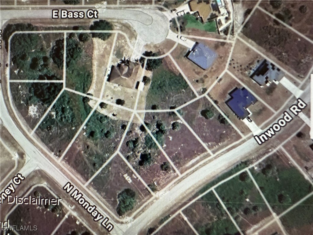 Inwood Road LaBelle, FL 33935 - Photo 8 of 8 an aerial view of a building