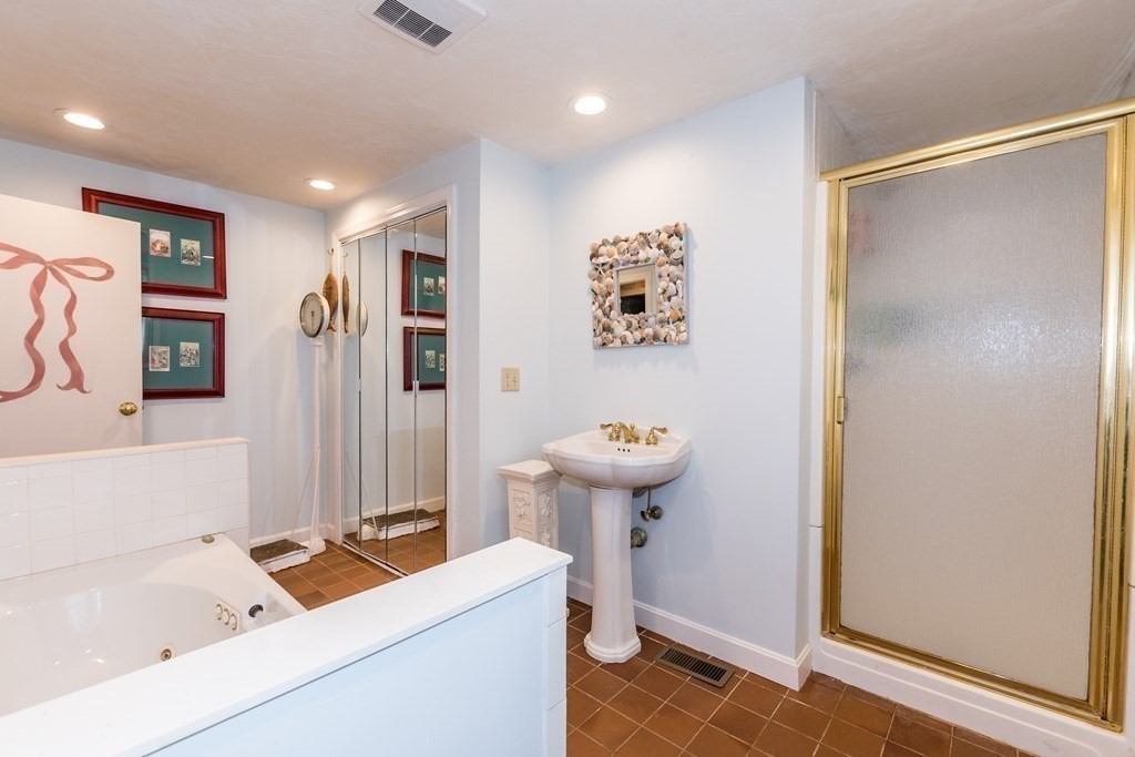 1371 Broadway Hanover, MA 02339 - Photo 16 of 24 a bathroom with a sink toilet and shower