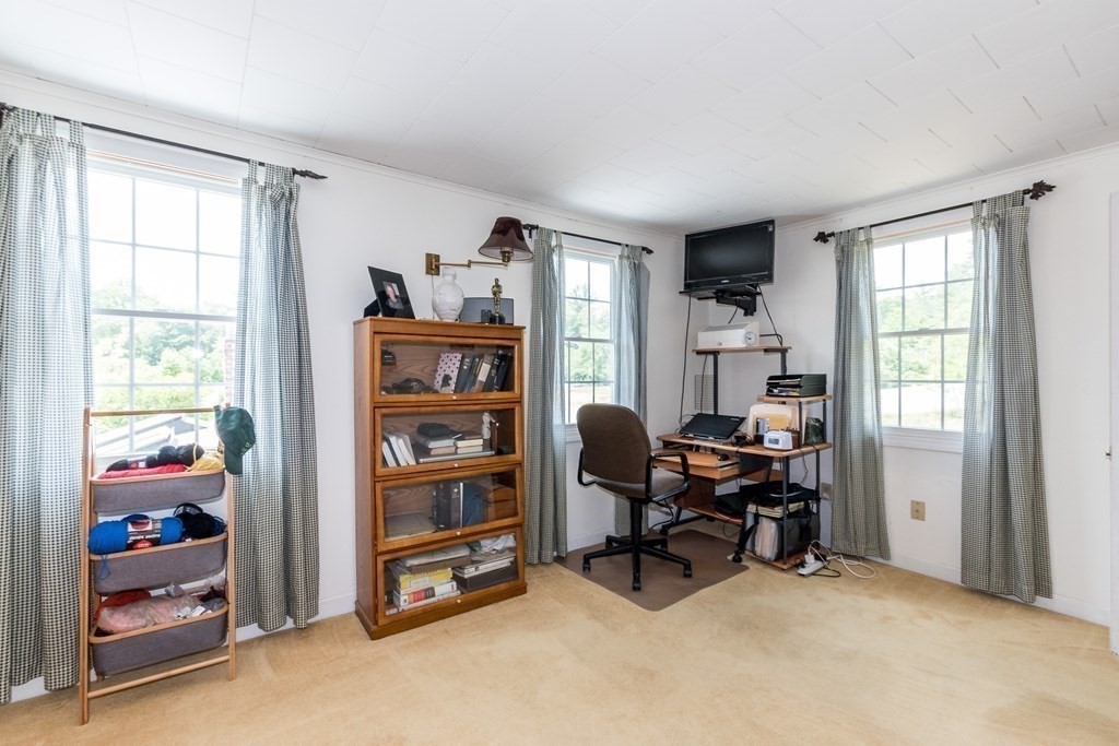 1371 Broadway Hanover, MA 02339 - Photo 4 of 24 a view of a livingroom with workspace and a window