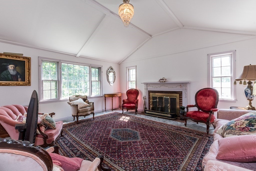 1371 Broadway Hanover, MA 02339 - Photo 8 of 24 a living room with furniture fireplace and window