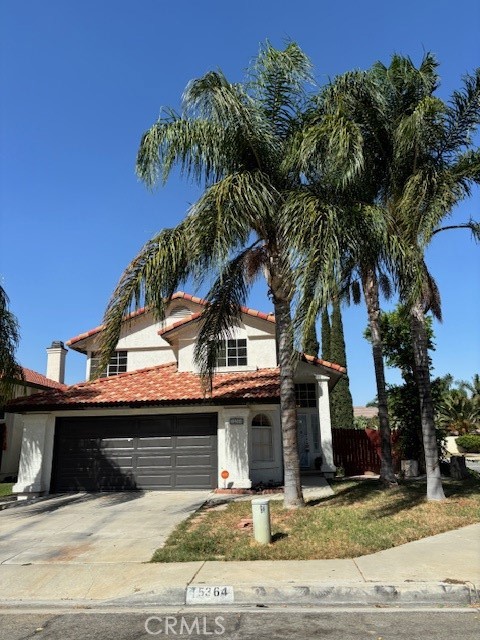 15364 Villaba Road Fontana, CA 92337 - Photo 1 of 1 a view of a house with a patio