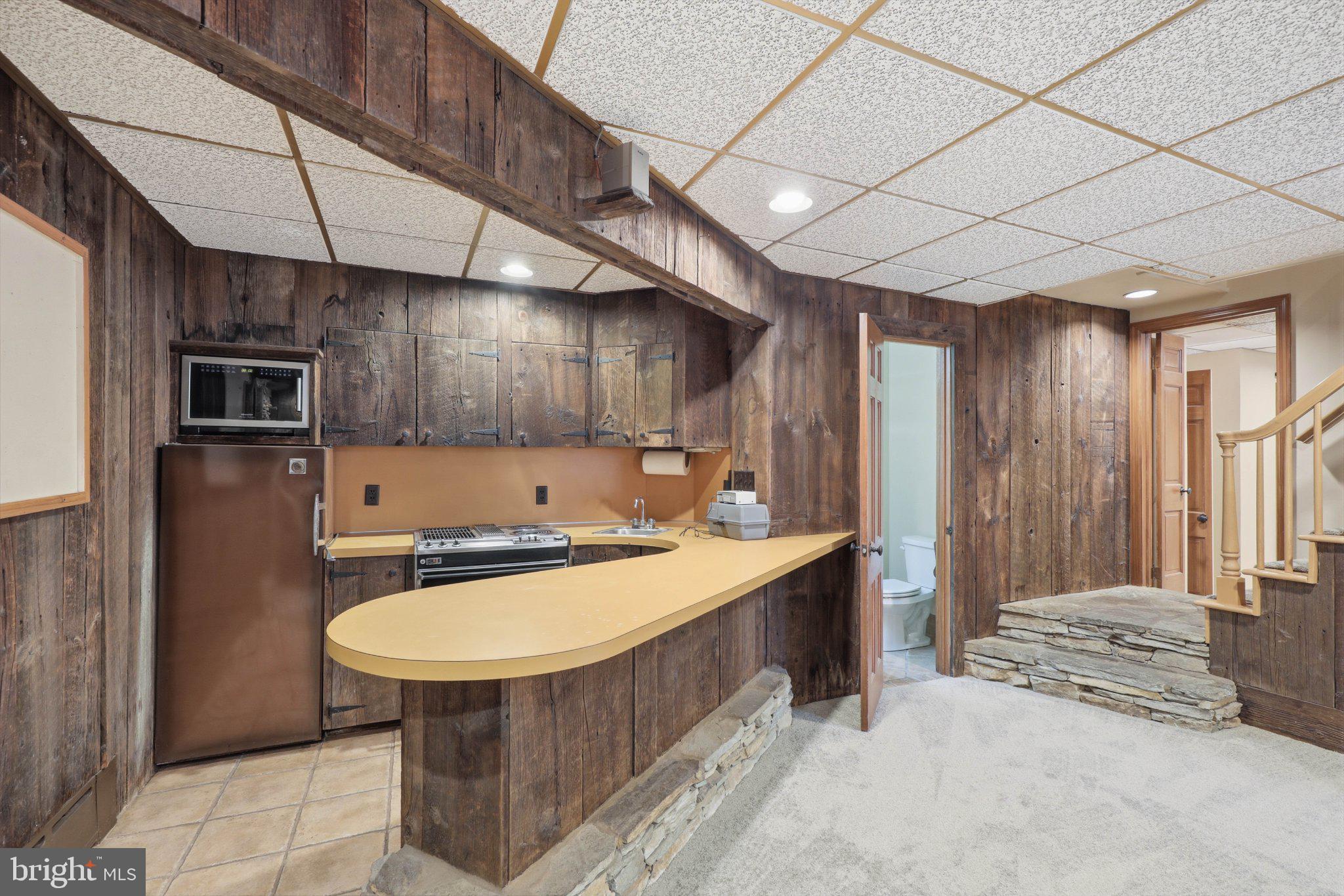 1300 Newton Road Lancaster, PA 17603 - Photo 41 of 68 Cozy basement retreat with rustic charm.