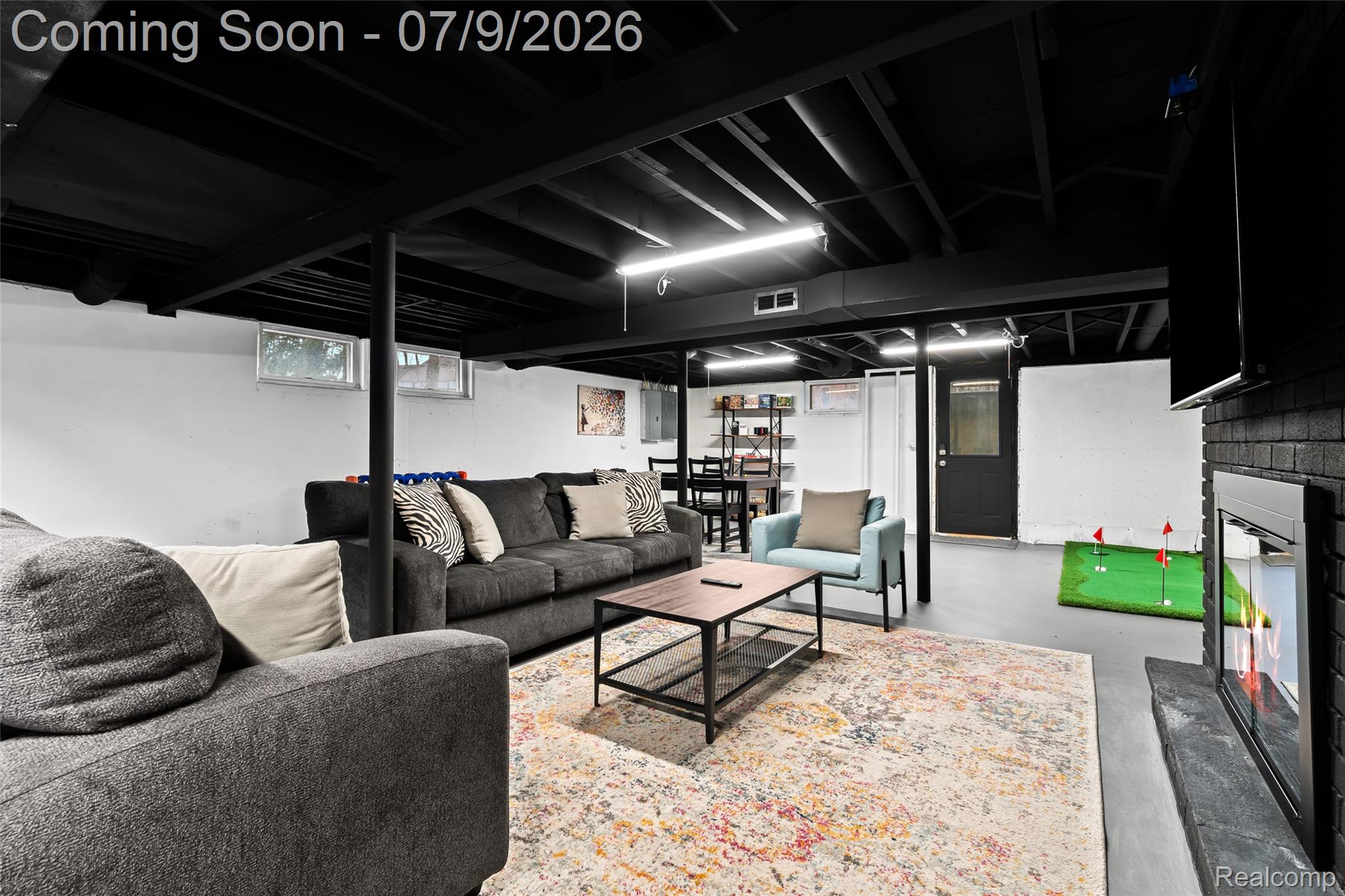 2566 Harrington Road Rochester, MI 48307 - Photo 52 of 64 2nd living room with Smart TV in the basement