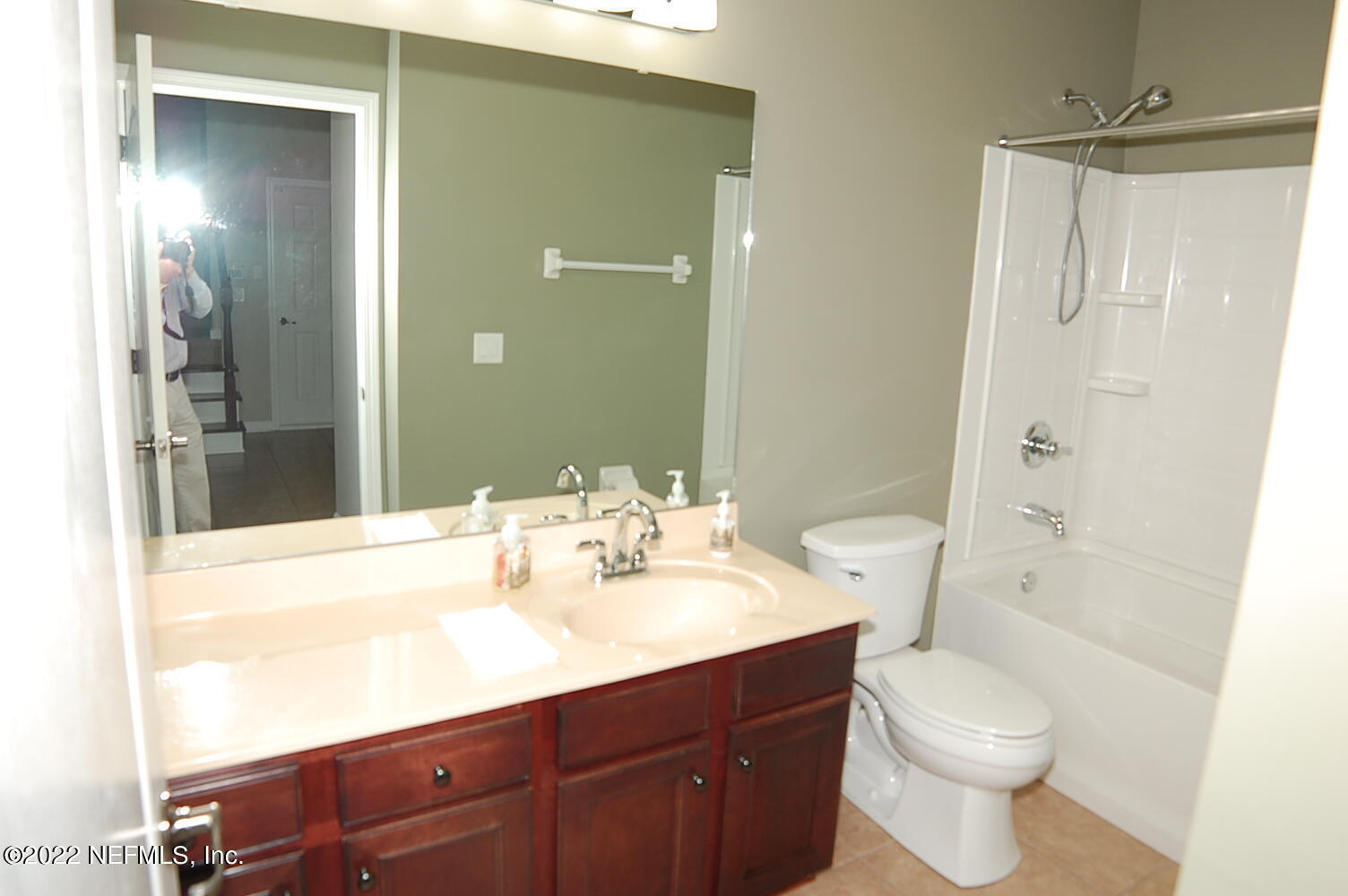 562 Candlebark Drive Jacksonville, FL 32225 - Photo 20 of 30 a bathroom with a sink a toilet and shower
