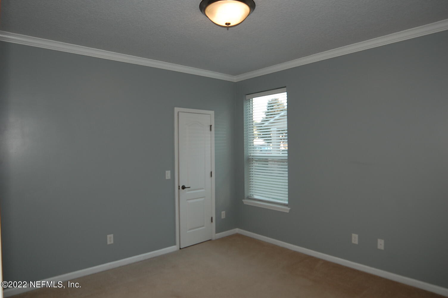 562 Candlebark Drive Jacksonville, FL 32225 - Photo 21 of 30 an empty room with window