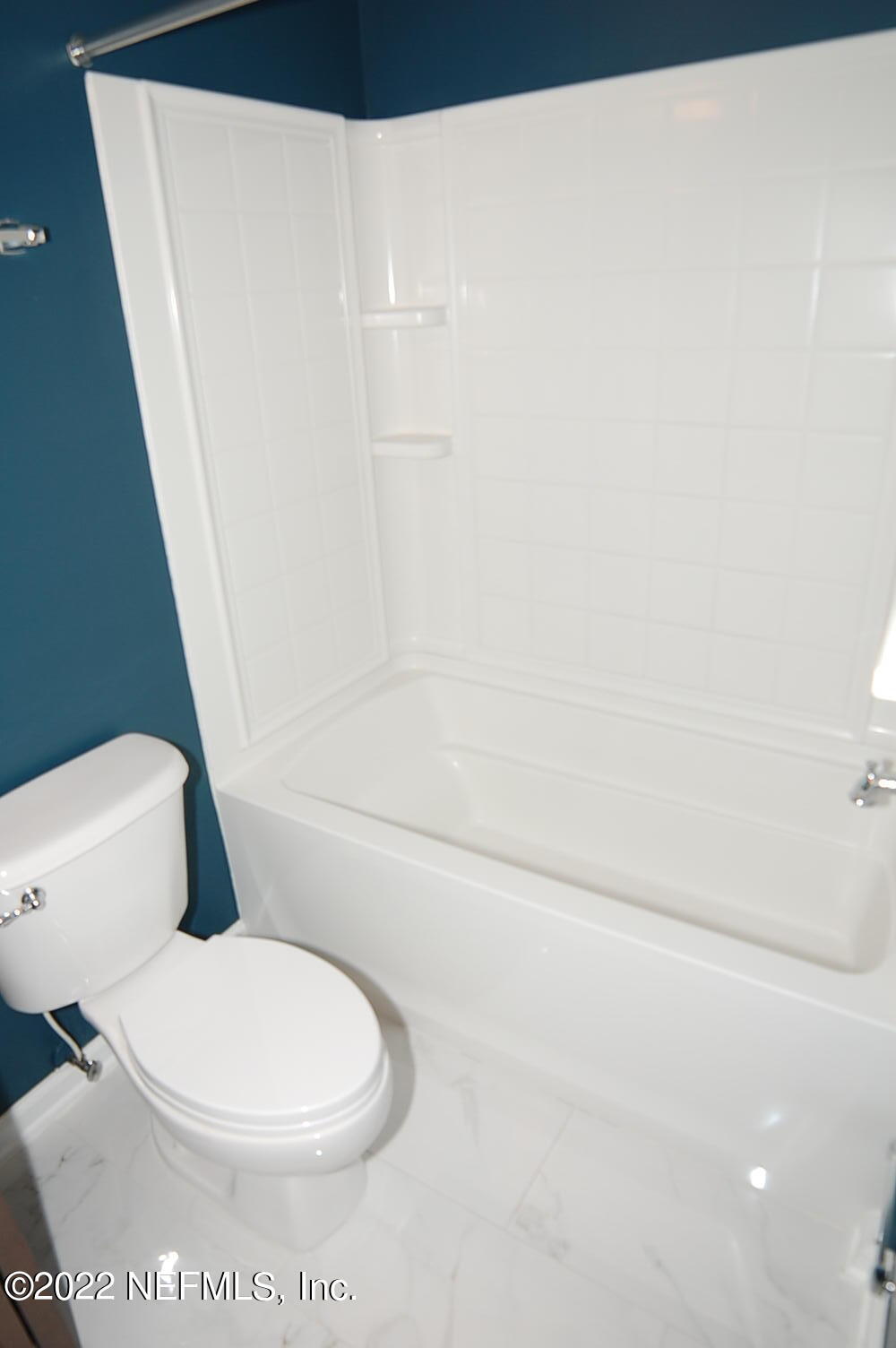 562 Candlebark Drive Jacksonville, FL 32225 - Photo 24 of 30 a white toilet sitting next to a white wall