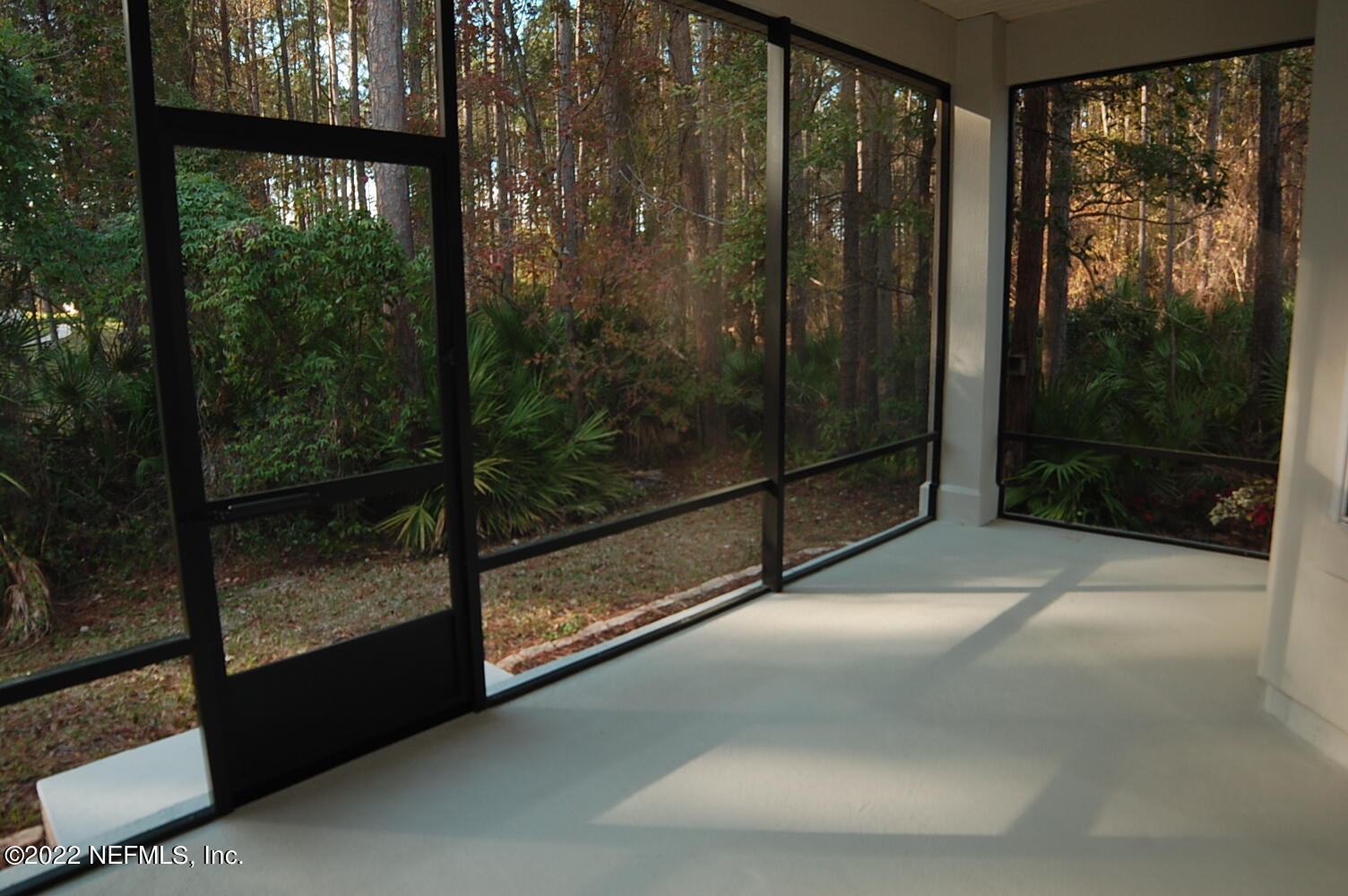 562 Candlebark Drive Jacksonville, FL 32225 - Photo 28 of 30 a view of a glass door and mountain view