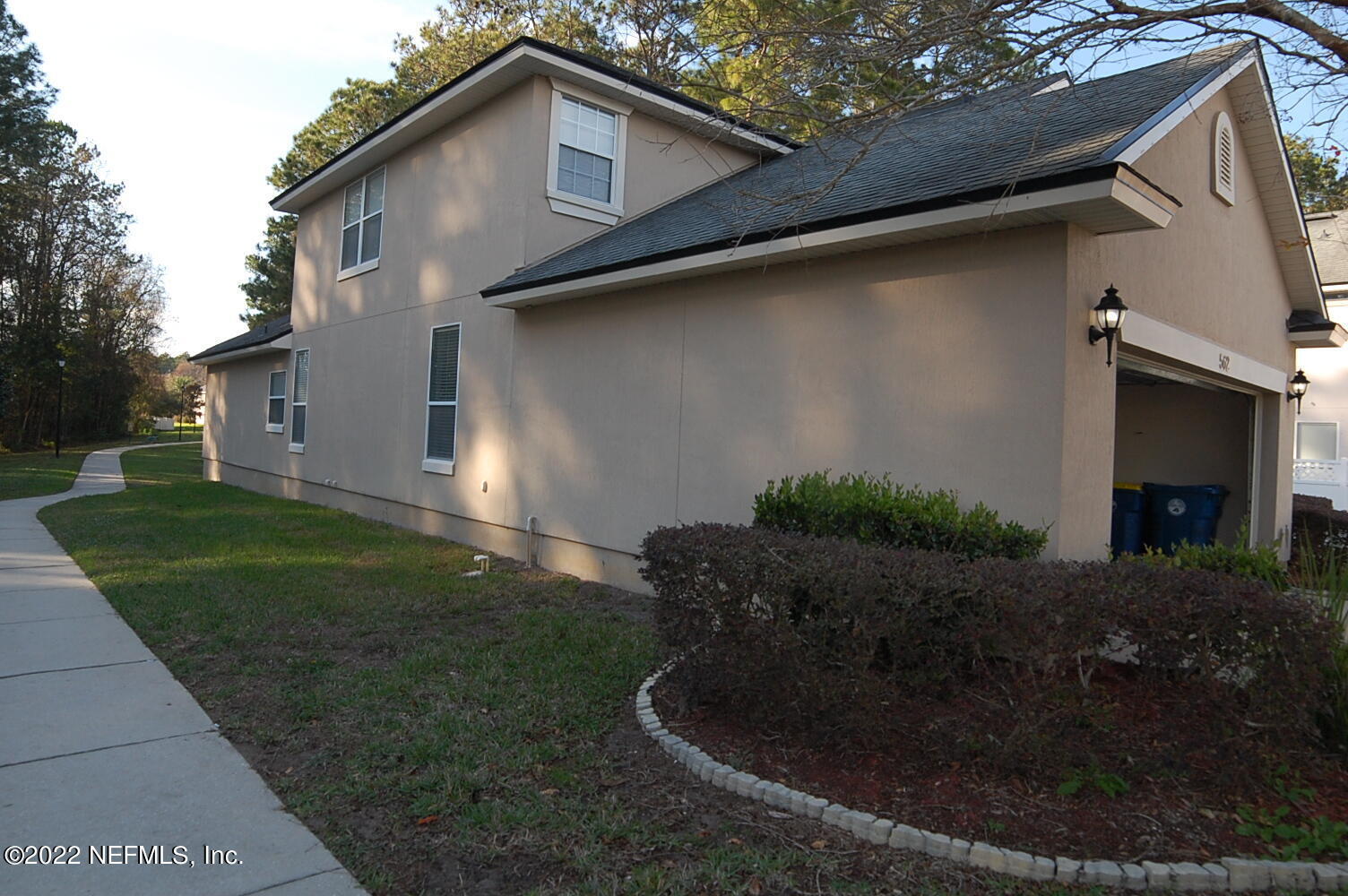 562 Candlebark Drive Jacksonville, FL 32225 - Photo 29 of 30 a house view with a garden space