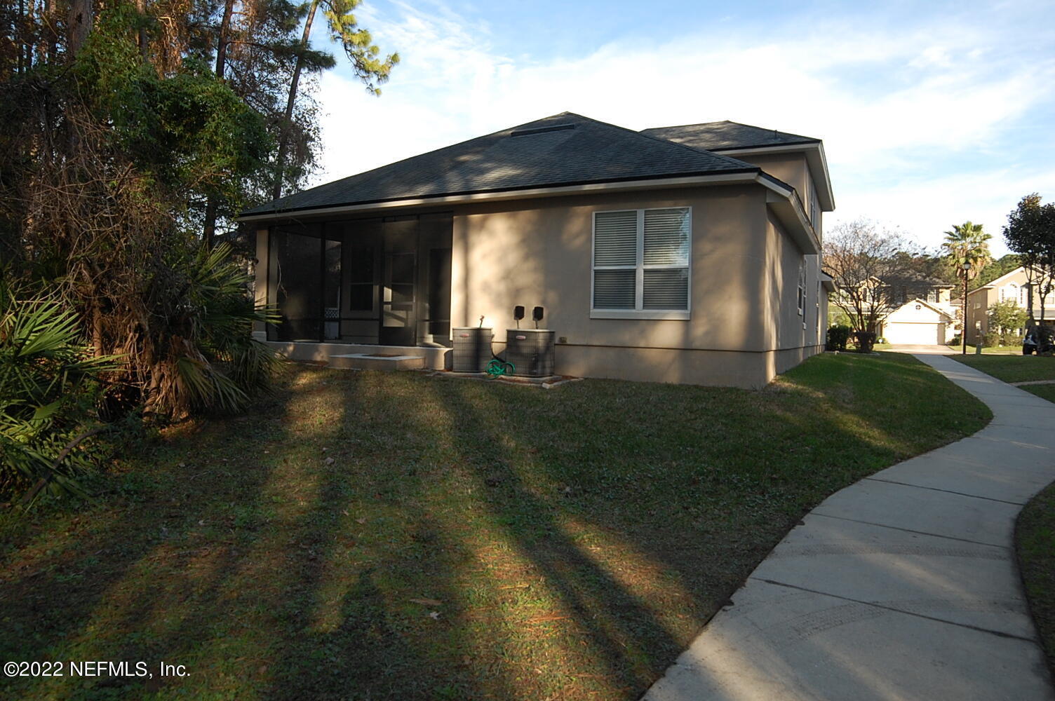 562 Candlebark Drive Jacksonville, FL 32225 - Photo 30 of 30 a front view of a house with a yard