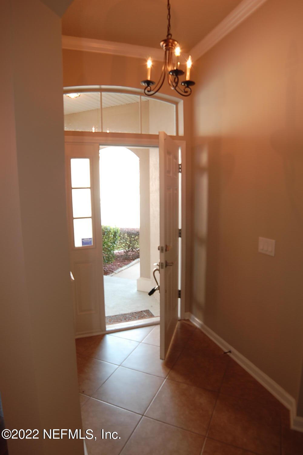 562 Candlebark Drive Jacksonville, FL 32225 - Photo 4 of 30 a view of an empty room with a window