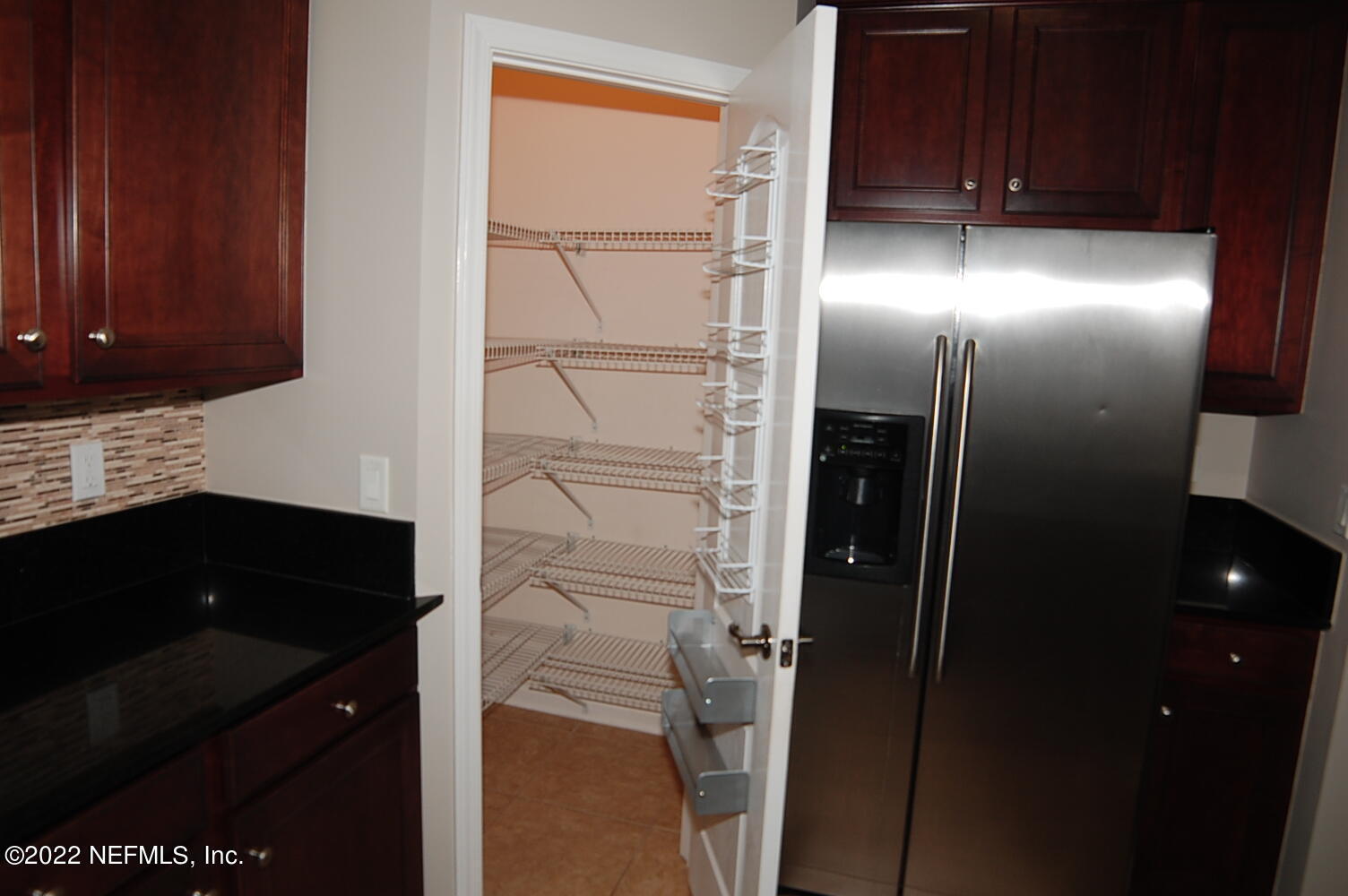 562 Candlebark Drive Jacksonville, FL 32225 - Photo 10 of 30 a bathroom with a sink and a mirror