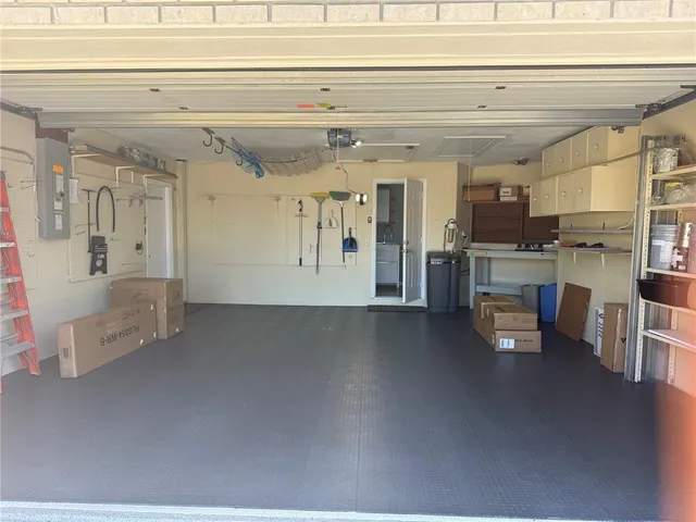 a view of a living room and chandelier