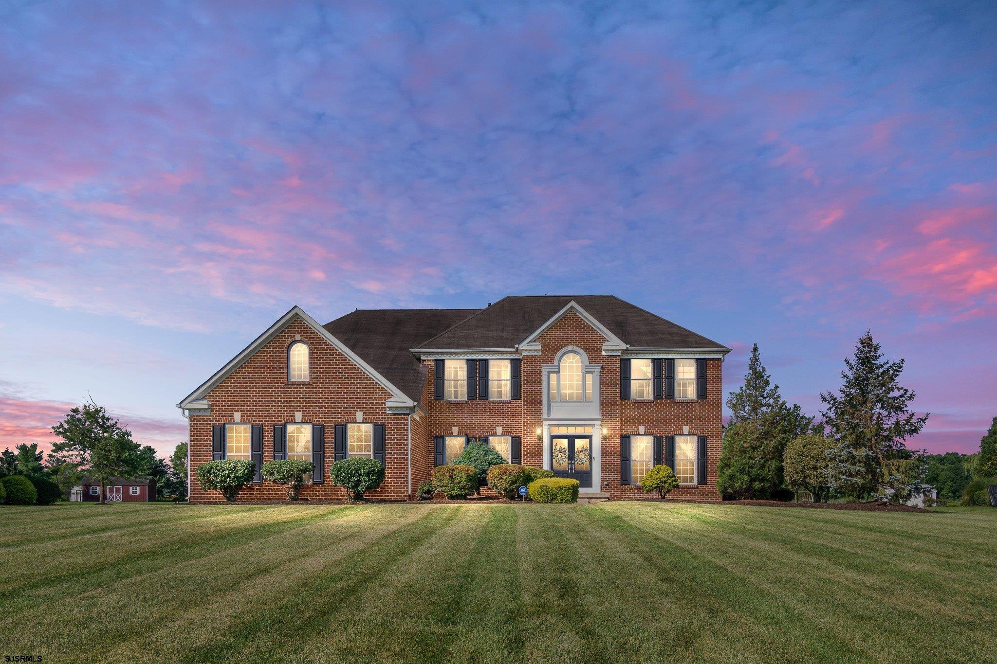 109 Quail Ridge Way Mickleton, NJ 08056 - Photo 1 of 59 a front view of a house with a yard