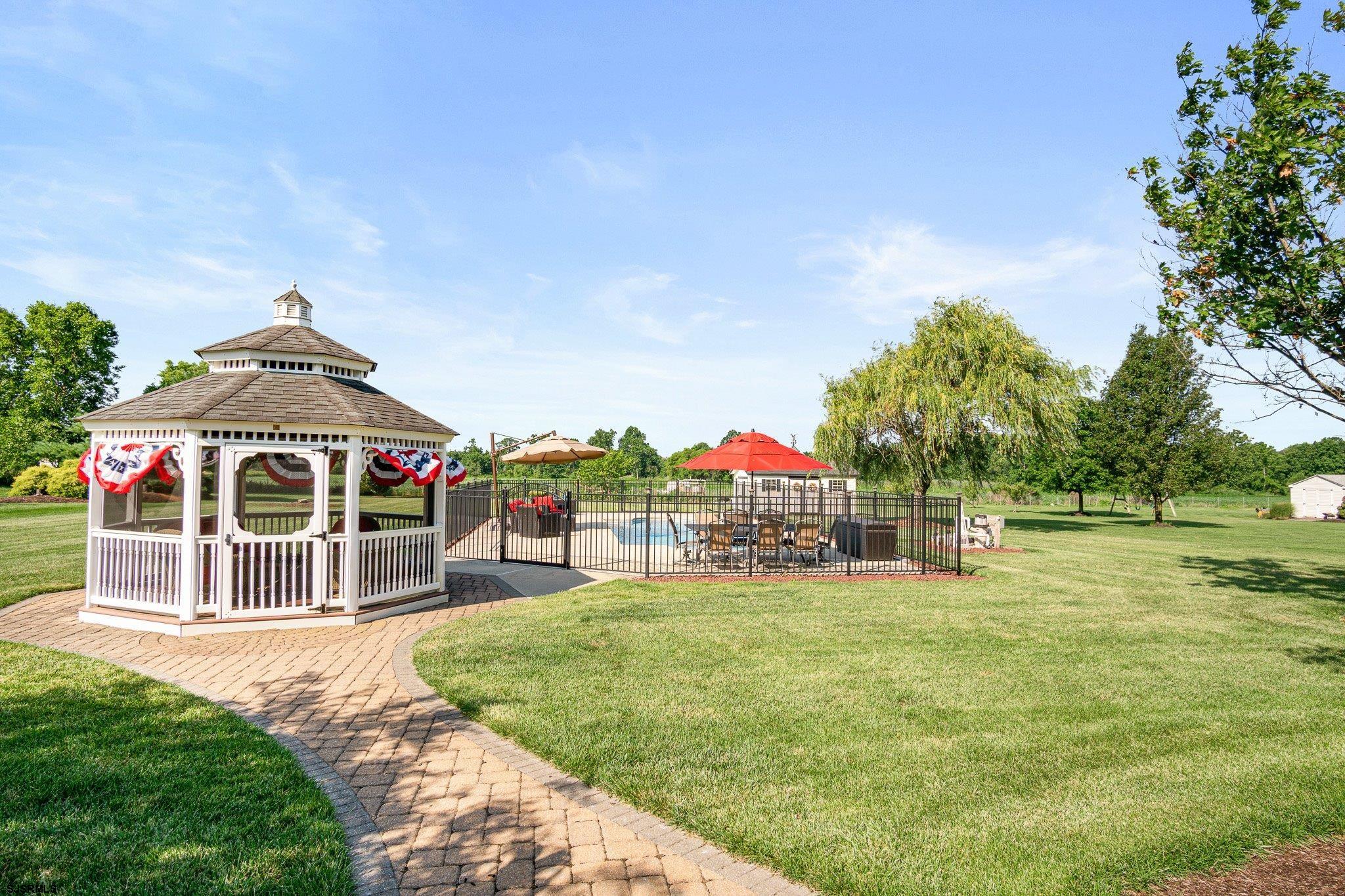 109 Quail Ridge Way Mickleton, NJ 08056 - Photo 14 of 59 a front view of a house with a yard