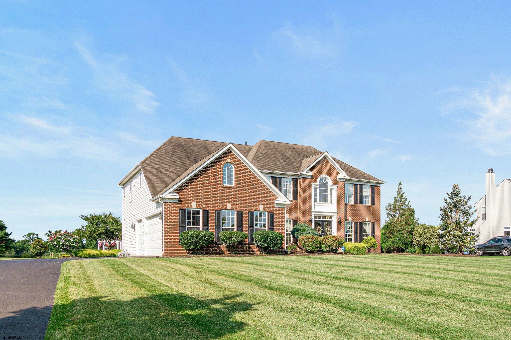109 Quail Ridge Way Mickleton, NJ 08056 - Photo 19 of 59 a front view of a house with a yard