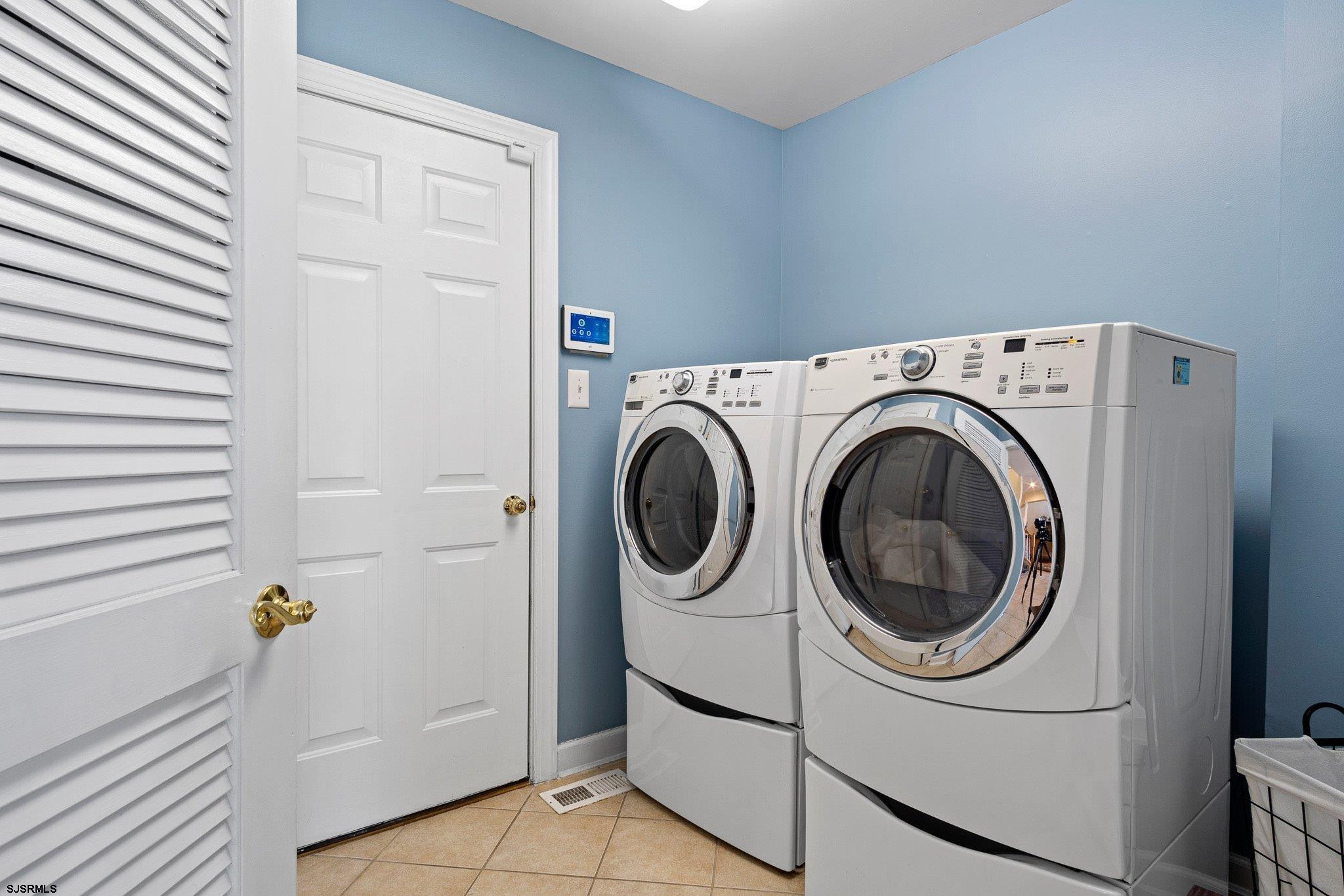 109 Quail Ridge Way Mickleton, NJ 08056 - Photo 20 of 59 a utility room with dryer and washer