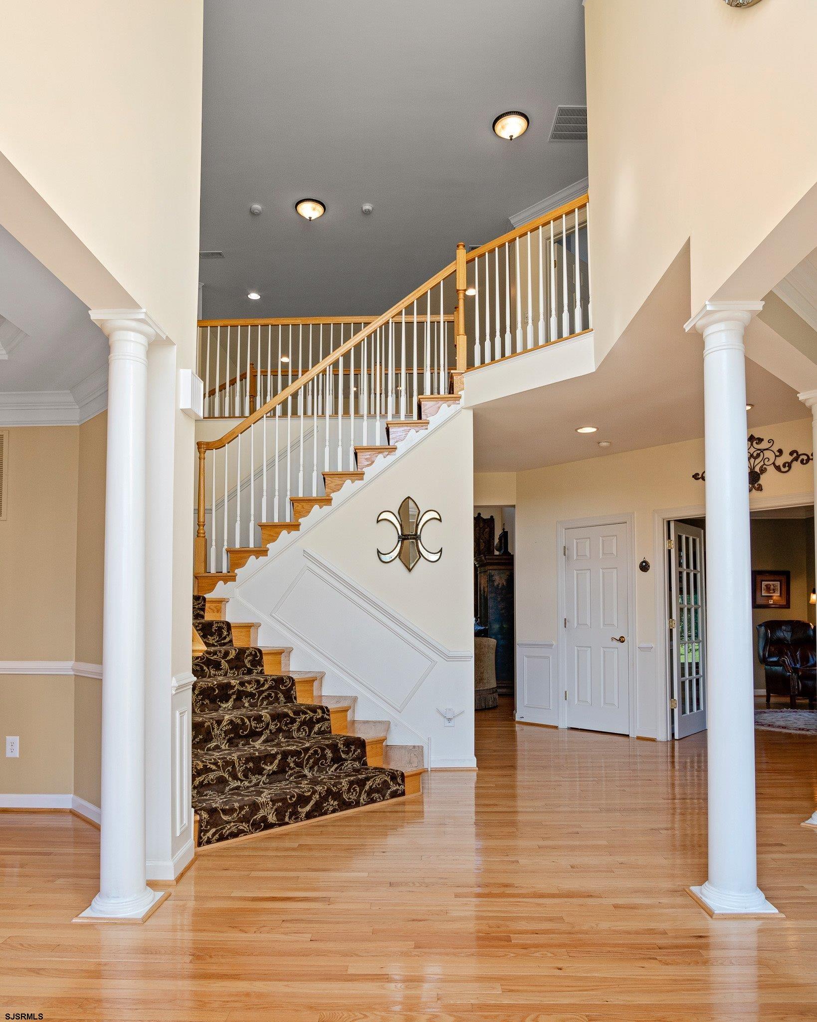 109 Quail Ridge Way Mickleton, NJ 08056 - Photo 25 of 59 a view of entryway and hall with wooden floor