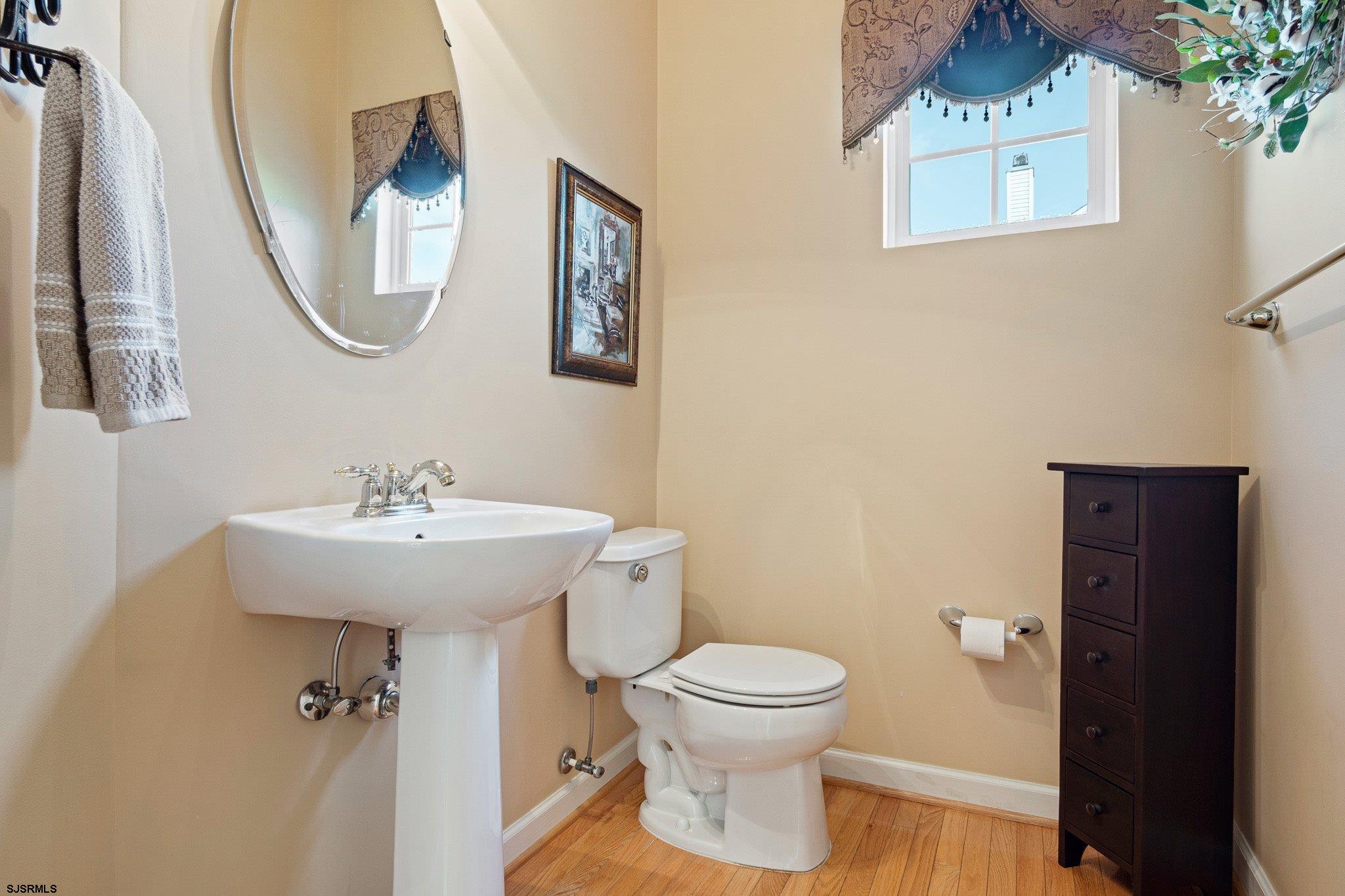 109 Quail Ridge Way Mickleton, NJ 08056 - Photo 30 of 59 a bathroom with a toilet sink and mirror
