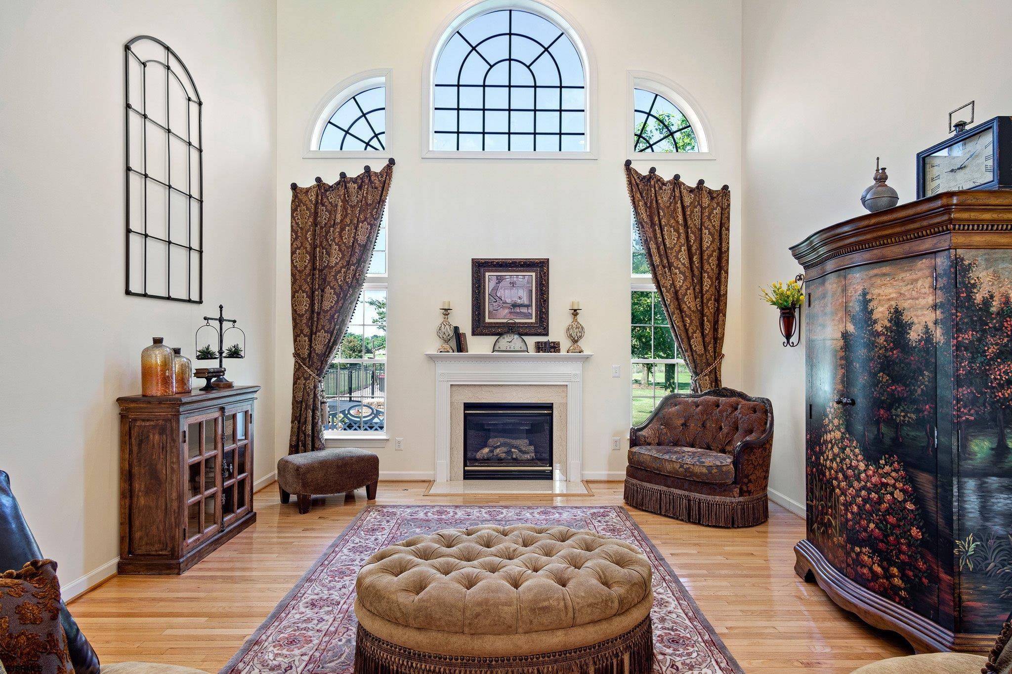 109 Quail Ridge Way Mickleton, NJ 08056 - Photo 33 of 59 a living room with furniture and a fireplace