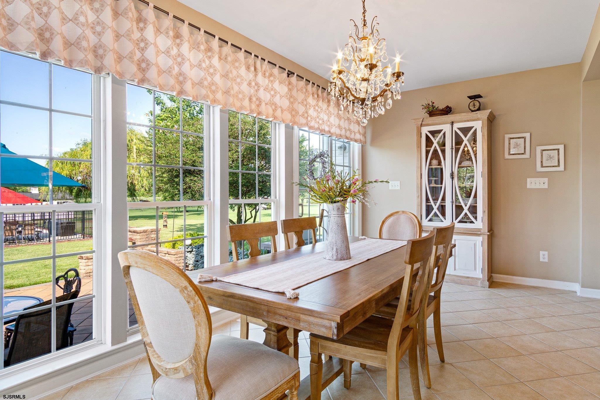 109 Quail Ridge Way Mickleton, NJ 08056 - Photo 35 of 59 a view of a dining room with furniture window and outside view